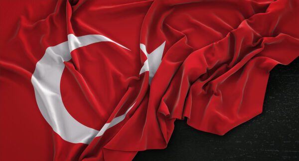 Turkey Flag Wrinkled On Dark Background 3D Render